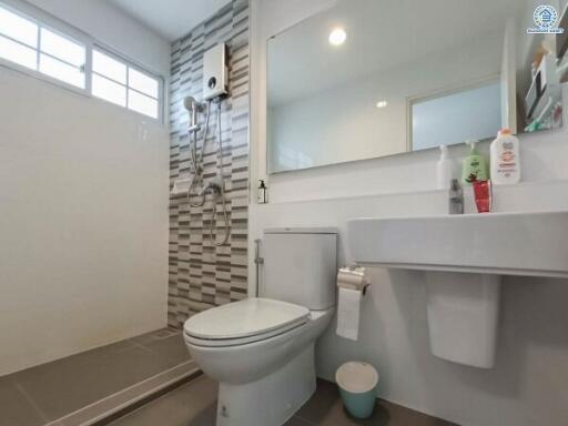 Modern bathroom with walk-in shower and vanity