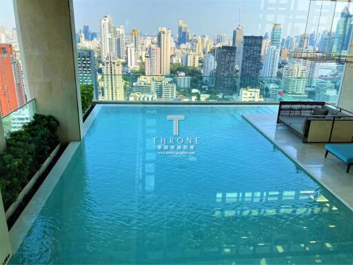 Luxury building indoor swimming pool with city skyline view