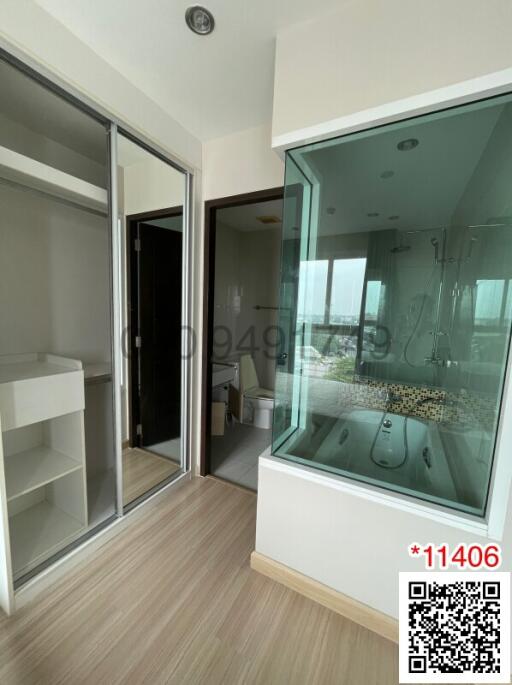 Modern bedroom interior with open ensuite bathroom featuring a jacuzzi