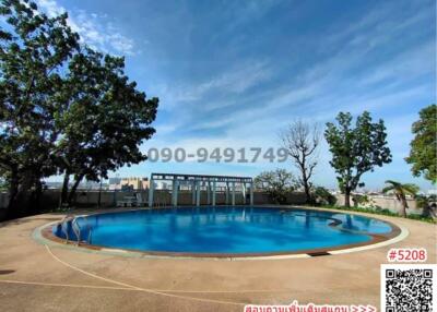 Spacious outdoor swimming pool with city views