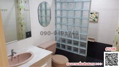 Modern bathroom with shower and vanity