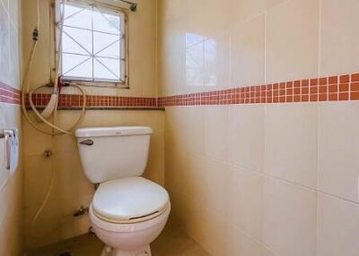 Clean bathroom with toilet and shower