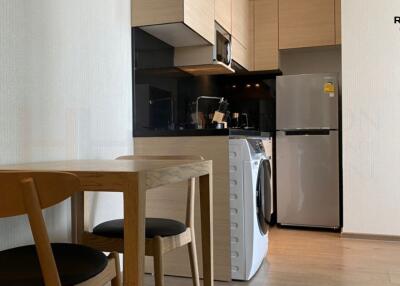 Modern kitchen with dining area in a contemporary apartment