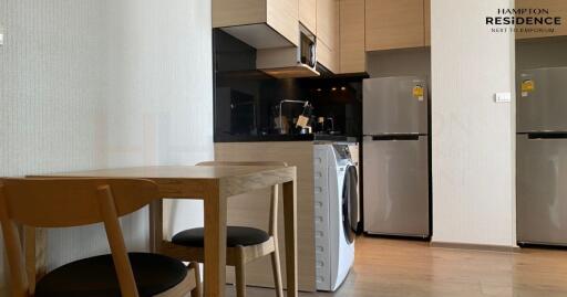 Modern kitchen with dining area in a contemporary apartment