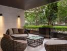 Elegant outdoor lounge area with comfortable seating and ambient lighting