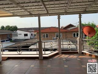 Spacious terrace with a view of neighboring buildings