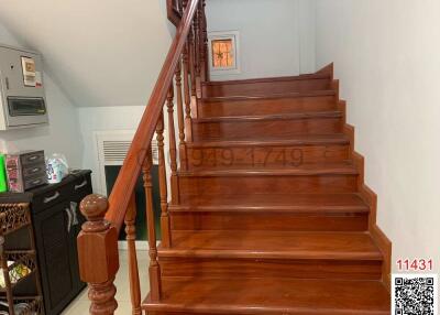 Elegant wooden staircase with varnished finish