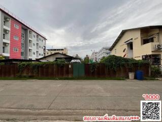 Exterior view of apartment buildings with cloudy sky