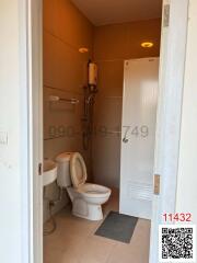 Compact bathroom with toilet and shower