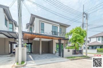 Modern two-story house with spacious garage and neat exterior