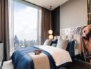 Modern bedroom with city skyline view