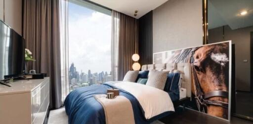 Modern bedroom with city skyline view