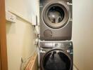 Stacked washer and dryer in a compact home laundry area