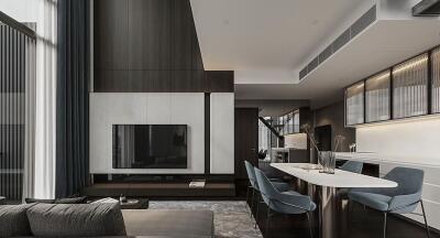 Modern living room with open kitchen and dining area