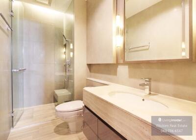 Modern bathroom with walk-in shower and large vanity
