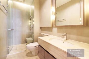 Modern bathroom with walk-in shower and large vanity