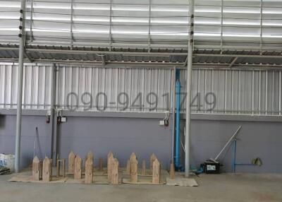 Spacious industrial warehouse interior with metallic structure