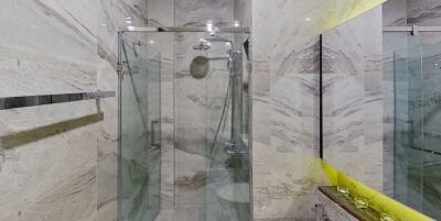 Modern bathroom with glass shower enclosure