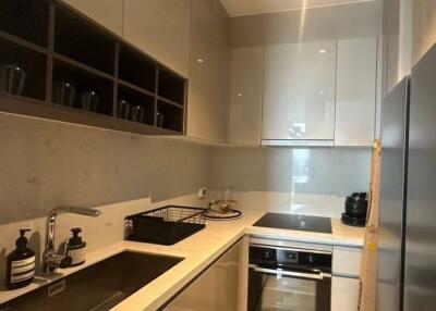 Modern kitchen with built-in appliances and ample cabinet space