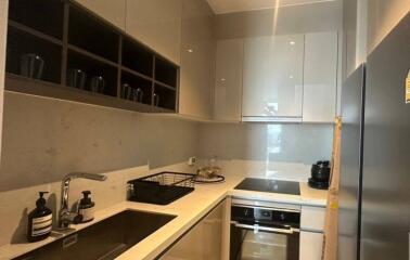 Modern kitchen with built-in appliances and ample cabinet space