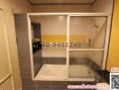 Compact modern bathroom with shower cabin and bathtub
