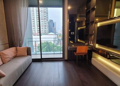 Modern living room with balcony access and city view