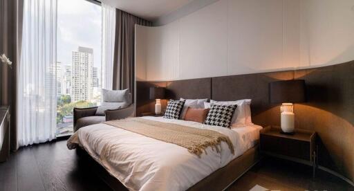 Modern bedroom with large window and city view