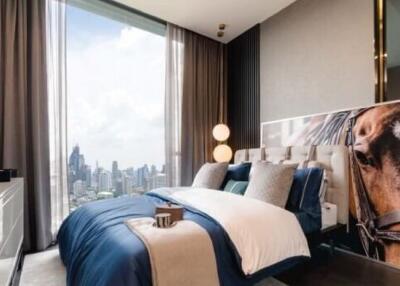 Modern bedroom with city view and stylish decor