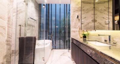 Modern bathroom interior with marble finishes and elegant fittings