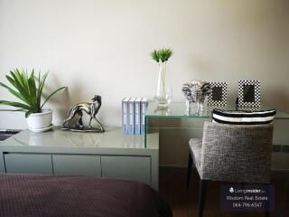 Elegant bedroom interior with decorative items on a dresser