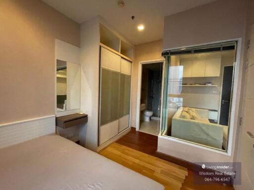 Cozy bedroom with en-suite bathroom and large mirror wardrobe