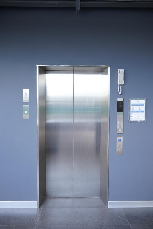 Modern elevator in a building lobby