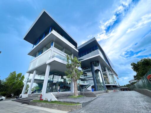 Modern multi-story commercial building with a dynamic architectural design