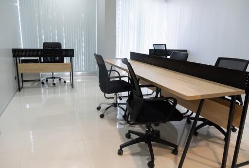 Modern office space with desks and chairs