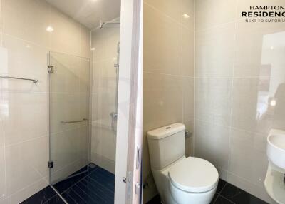 Modern bathroom interior with glass shower, white toilet, and basin