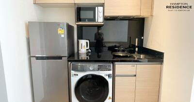 Modern kitchen with integrated appliances at Hampton Residence