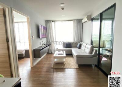 Modern and spacious living room with balcony access