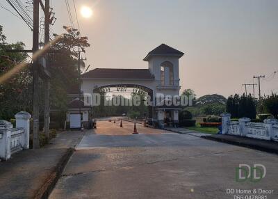 Sunset view of a residential community entrance gate