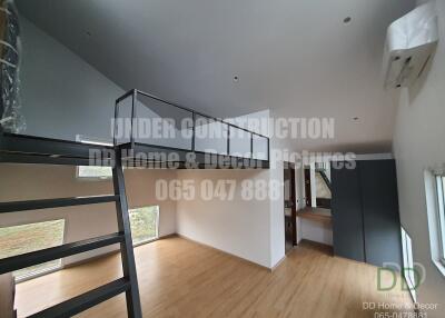 Modern bedroom interior with loft beds and open concept layout under construction