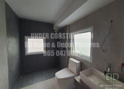 Under construction modern bathroom interior with natural light