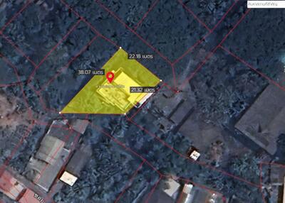 Aerial view of a land plot with highlighted boundaries