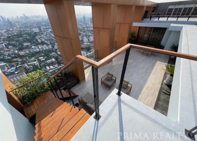 Spacious balcony with city skyline view and modern design