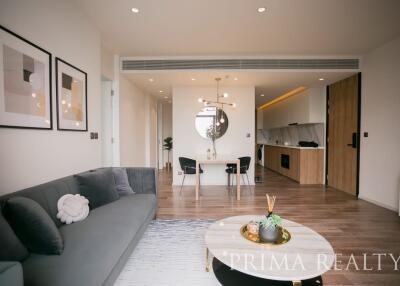 Modern living room with an open kitchen and dining area