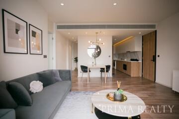 Modern living room with an open kitchen and dining area