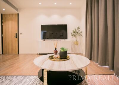 Elegant living room with modern design and wooden accents