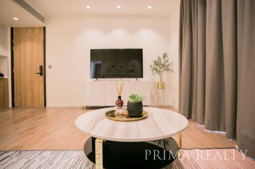 Elegant living room with modern design and wooden accents