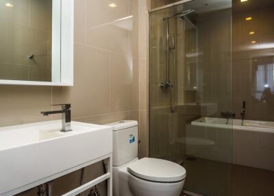 Modern bathroom with large mirror and glass shower