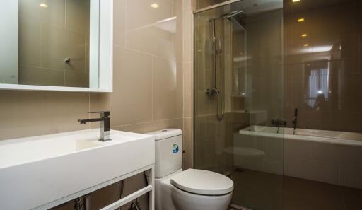 Modern bathroom with large mirror and glass shower