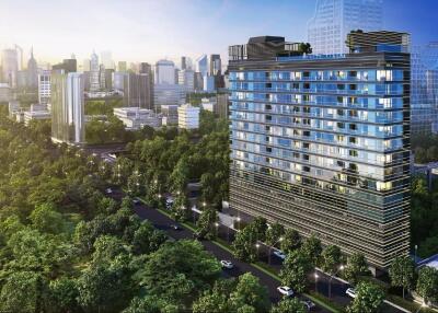 Modern high-rise residential building with lush green surroundings and city skyline in the background