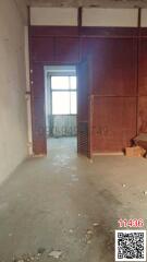 Unfinished interior room with construction debris